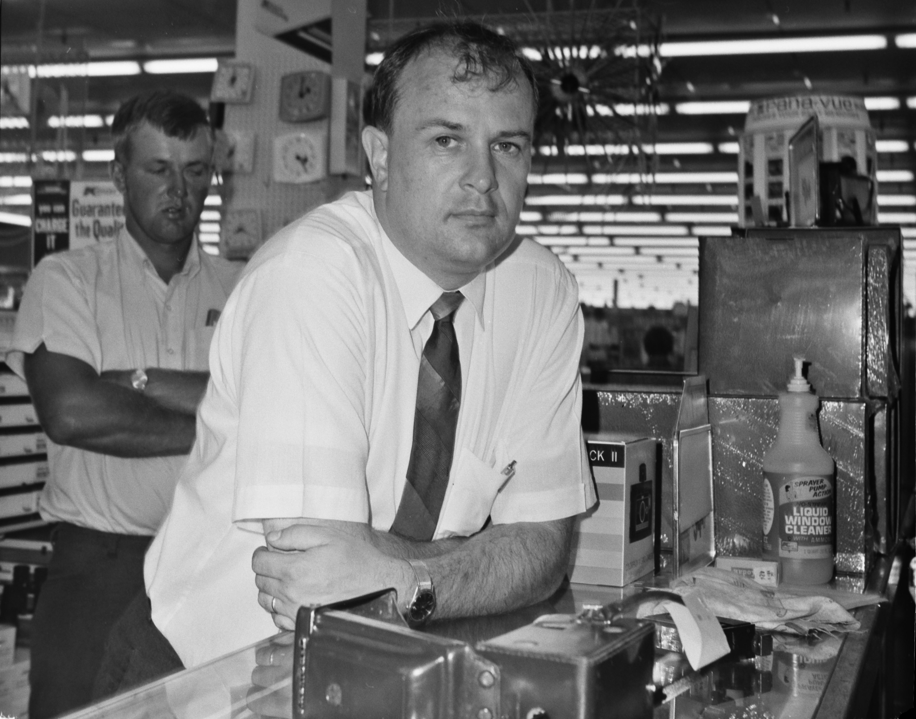 Ray brings the Yashica D to K-mart to develop a roll of 120 film. There is one photo left on the roll, so the Photo Department manager takes Ray's picture.